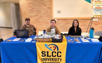 National Transfer Student Week bridges gap between students and the transfer process Three transfer staffers seated at a table waiting to assist students