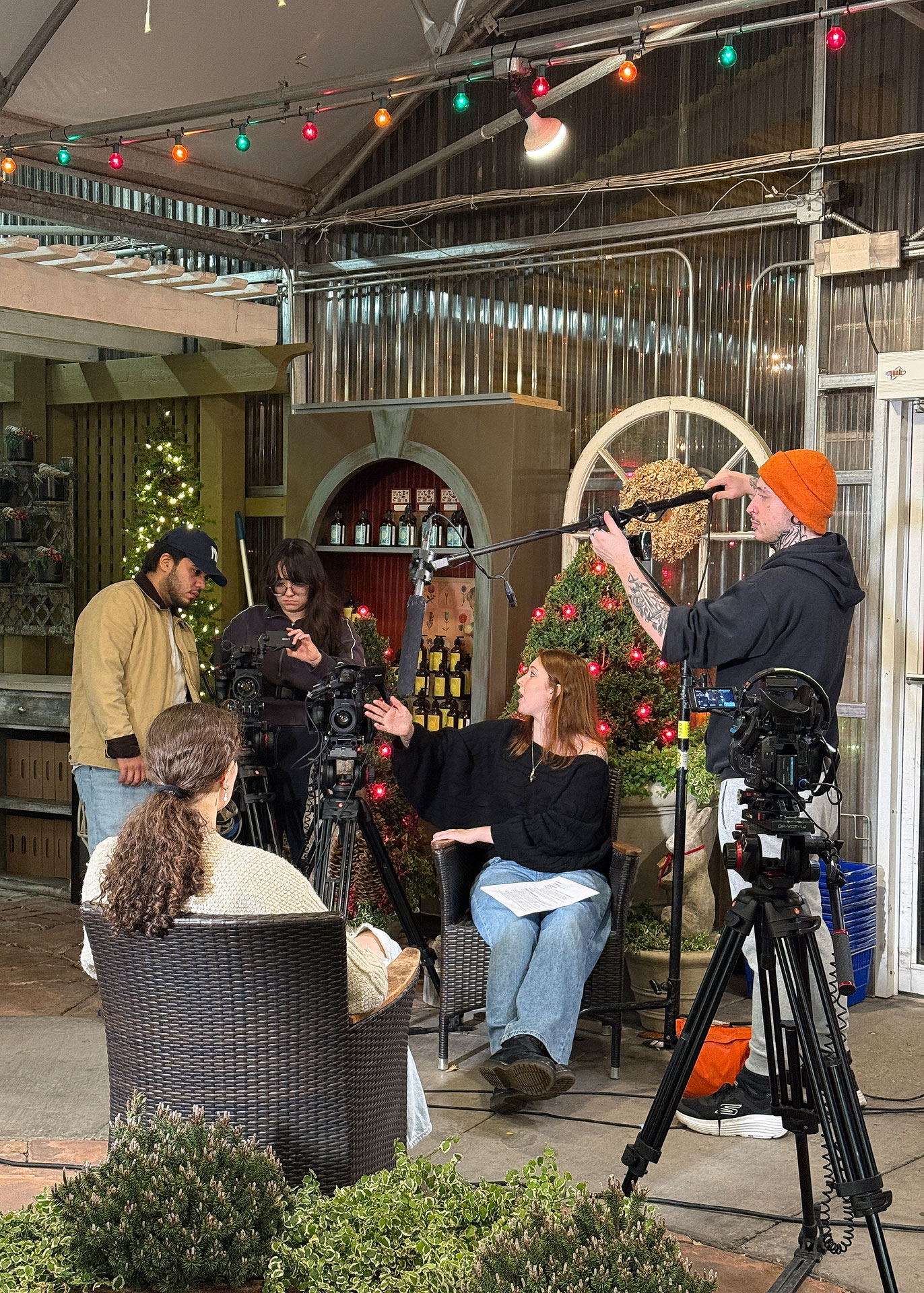 Film crew recording an interview