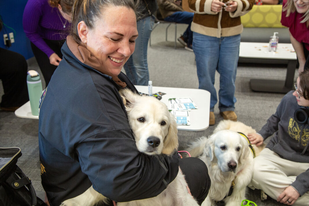 Woman hugging her dog