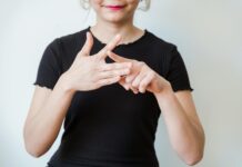 SLCC helps fill demand with the ASL Interpreter Training Program A person doing sign language