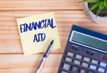 Enforcement of federal financial aid regulations to begin fall 2026 Financial aid text on a sticky note