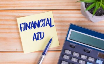 Enforcement of federal financial aid regulations to begin fall 2026 Financial aid text on a sticky note