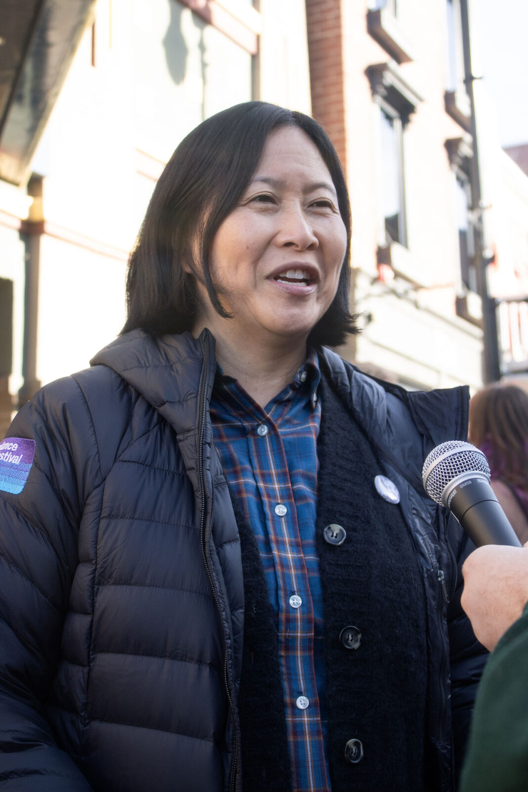 Kim Yutani answering a question from a reporter