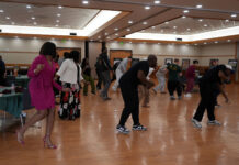 Black History Month event highlights traditions through dance and personal culture People learning a dance as LaDonte gives instructions