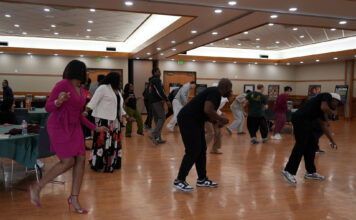 Black History Month event highlights traditions through dance and personal culture People learning a dance as LaDonte gives instructions