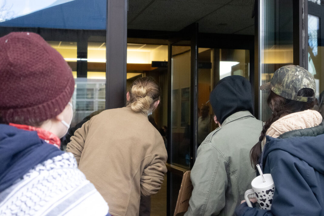 Landscape photo of a group of SLCC protesters