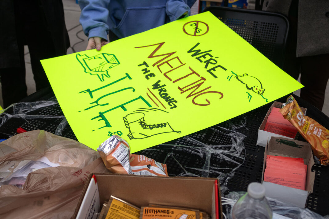 Landscape photo of neon poster with snacks and resources on an outdoor table