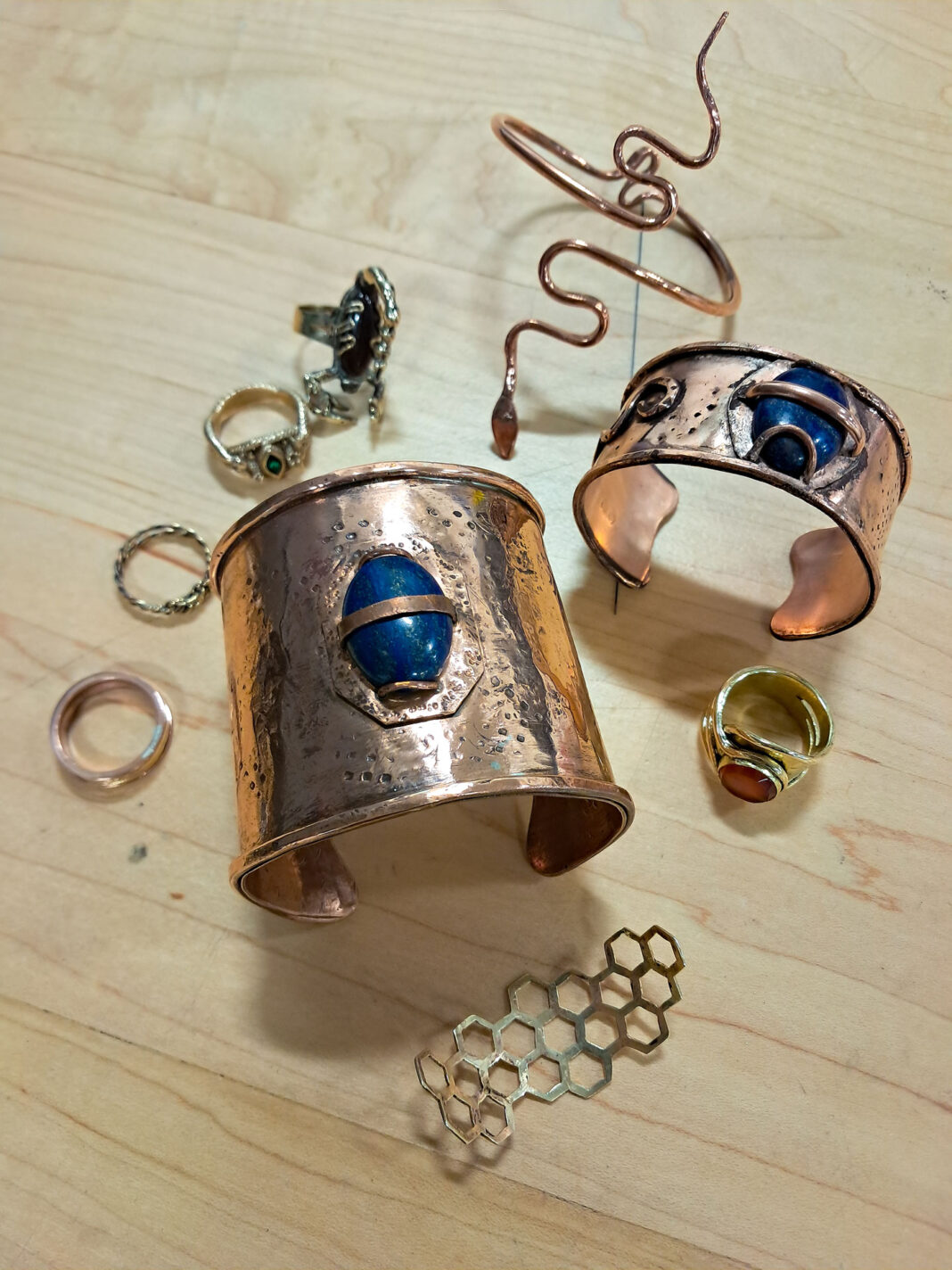 Several pieces of jewelry sitting on a table