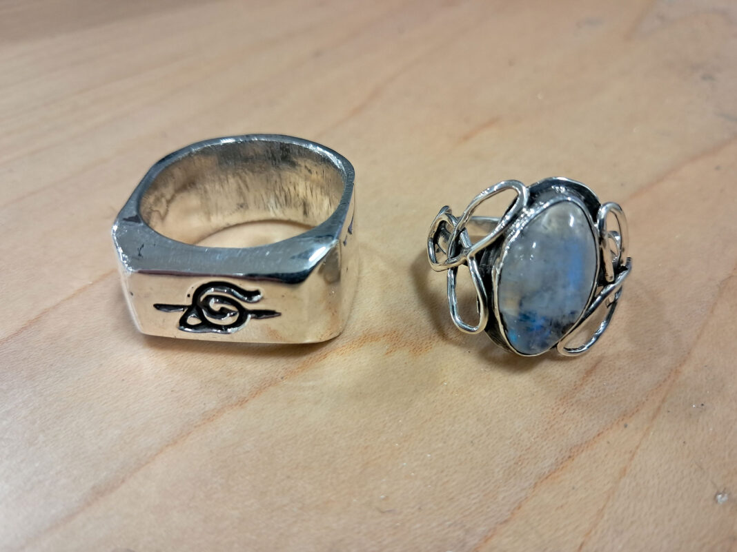Two rings sitting on a table