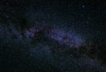 Poem: ‘Stars’ Night sky, many stars with milky way around Cygnus constellation, North America nebula visible