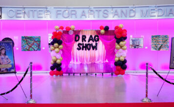 In photos: SLCC’s 4th Annual Drag Show draws big crowd Drag show red carpet and balloon display inside the CAM foyer