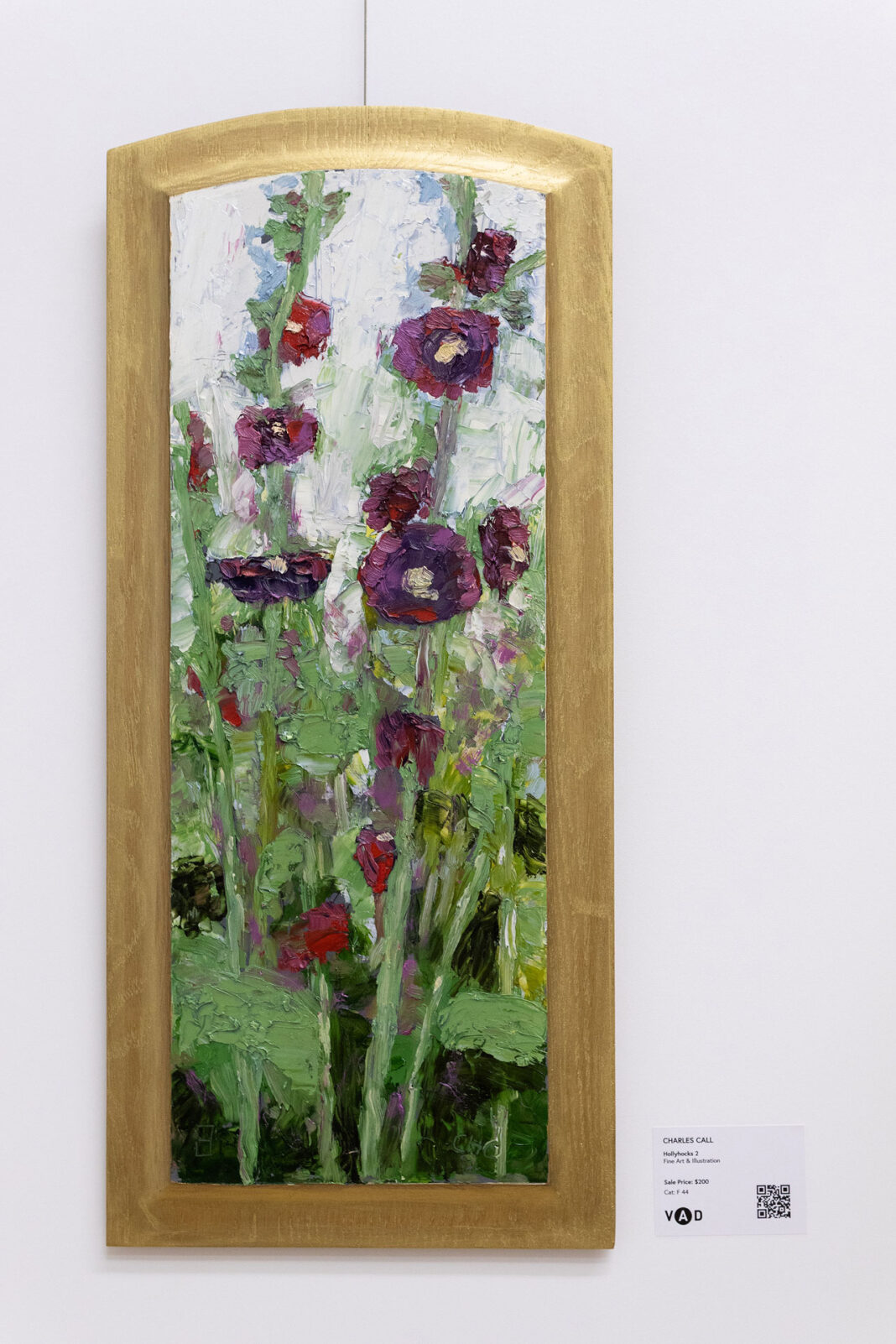 Painting of flowers on a wood backing