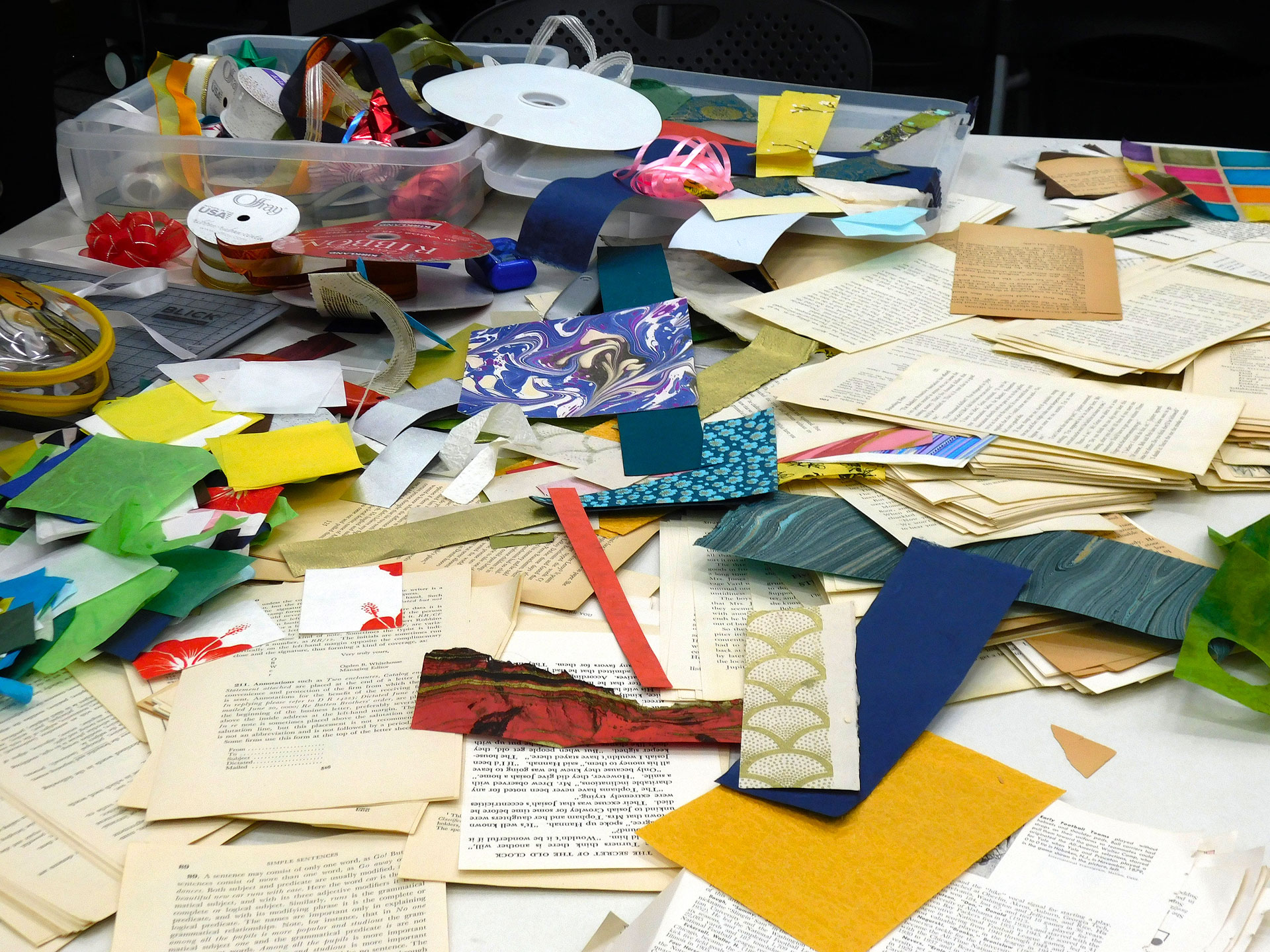 Miscellaneous crafting supplies scattered on a table