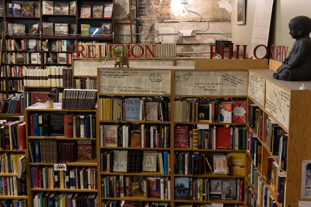 Religion and Philosophy books on appropriately labeled shelves