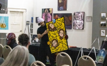 What SLCC creatives can gain from UAA’s Connect program Landscape shot of an art gallery participant presenting their art piece