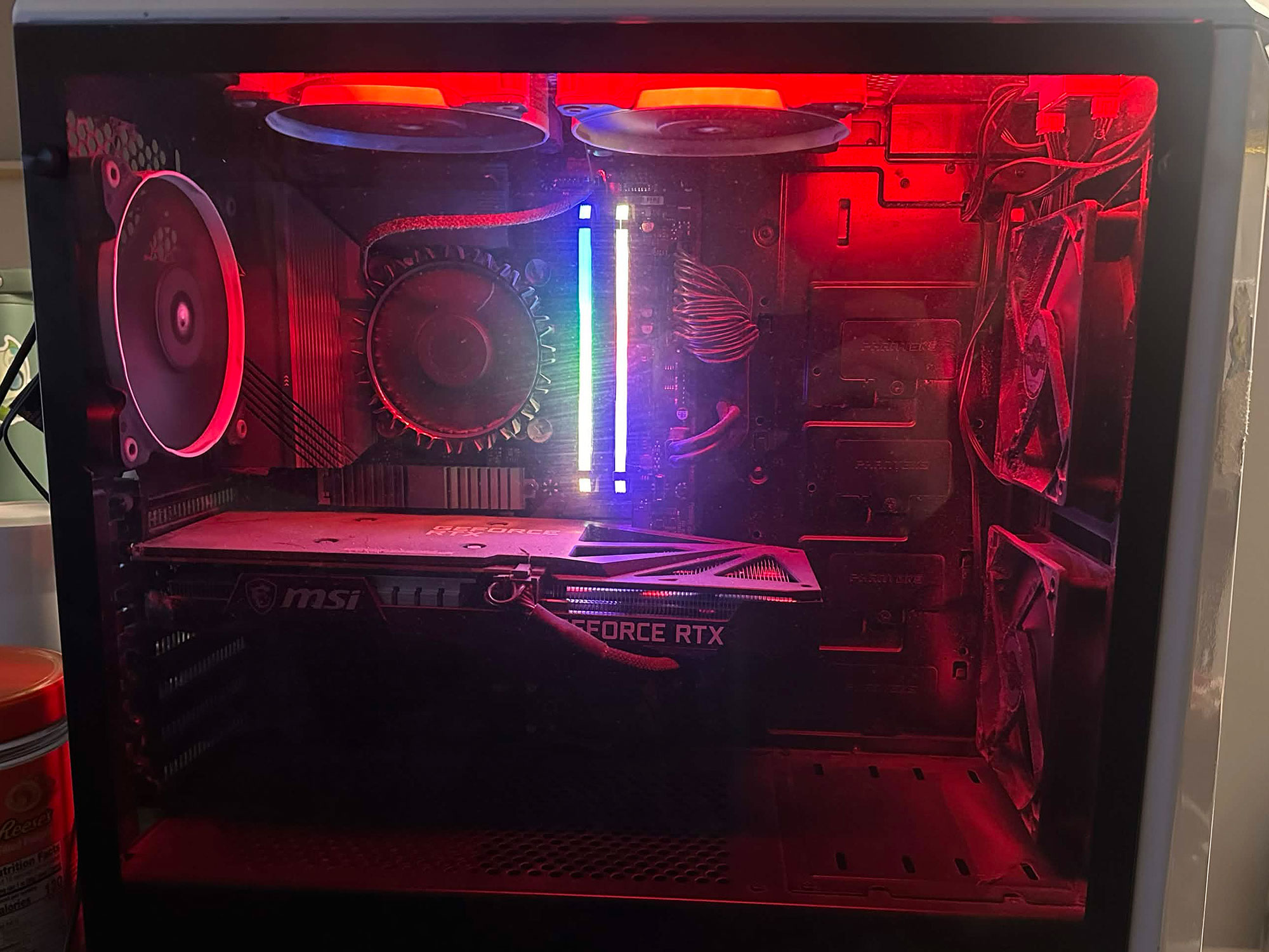View of computer hardware inside illuminated inside a computer tower