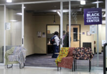 ‘A really sad loss’: Weber State students talk about life after closing campus centers in DEI purge Multiple people standing and talking inside a lounge area with a Black Cultural Center sign near the entrance
