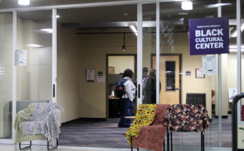 ‘A really sad loss’: Weber State students talk about life after closing campus centers in DEI purge Multiple people standing and talking inside a lounge area with a Black Cultural Center sign near the entrance