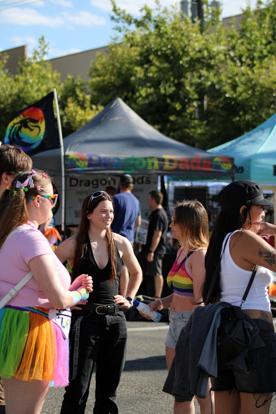 Festivalgoers socializing outside on a city street
