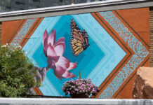 In photos: South City Campus murals Brick wall adorning a large mural of a Monarch butterfly