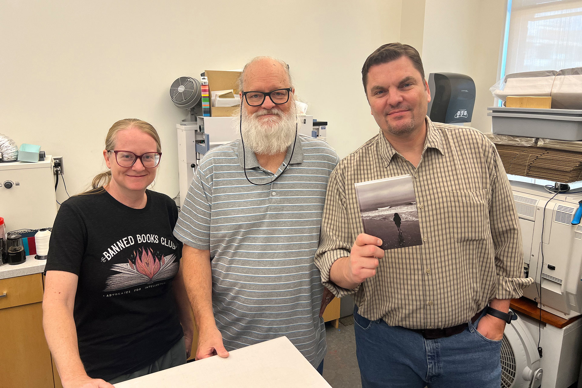 Brenda, Ken, and Mark in the publication production area