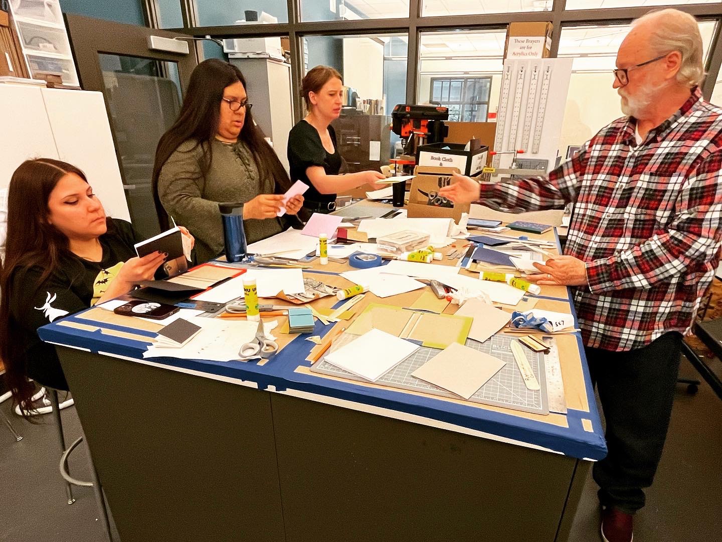 Ken Nelson, right, coaching workshop attendees
