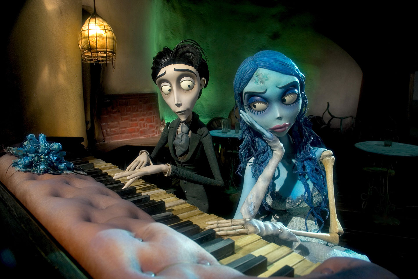 Victor looking at corpse bride while playing piano
