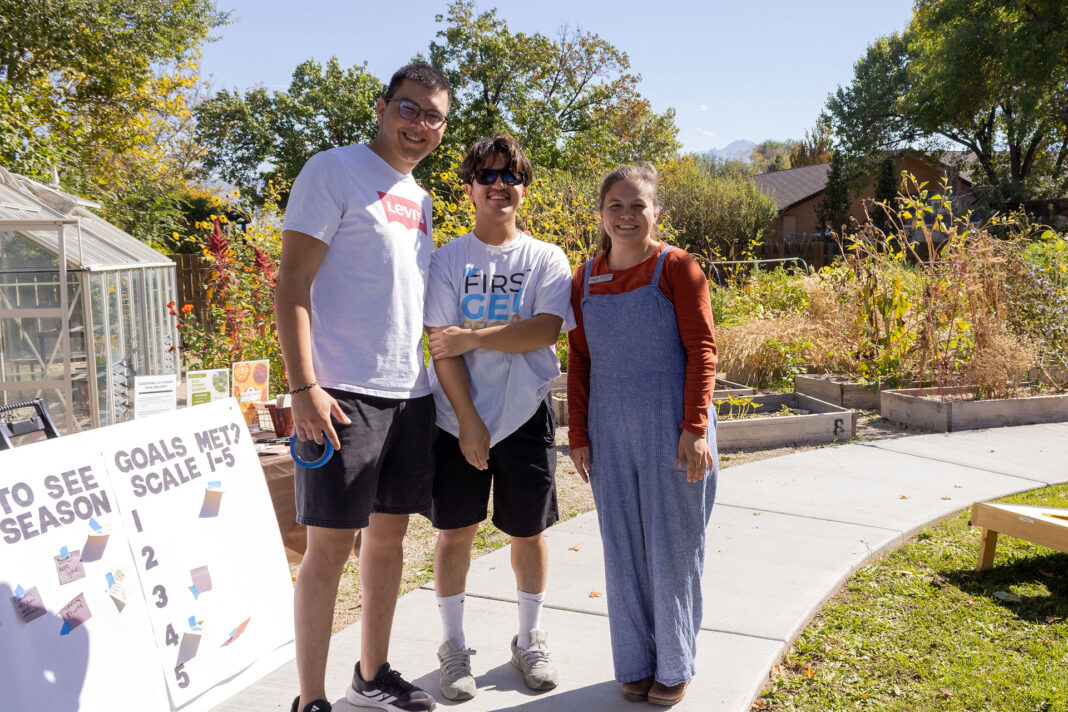 Three people celebrating a successful growing season