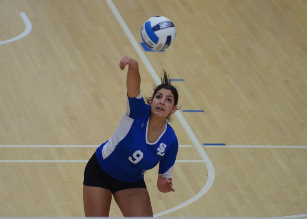 Bruin Volleyball loses a heartbreaker to place fourth at Nationals Mariana Pilon strikes the ball against the Cardinals