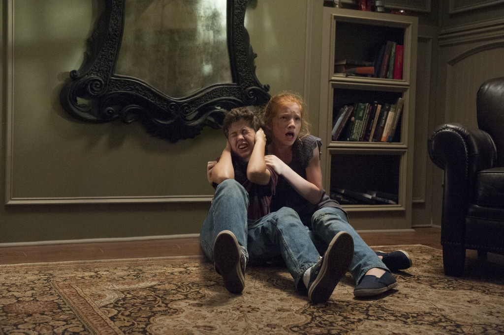 Movie review: Lack of consistency ruins ‘Oculus’ Garrett Ryan and Annalise Basso in a scene from 'Oculus'