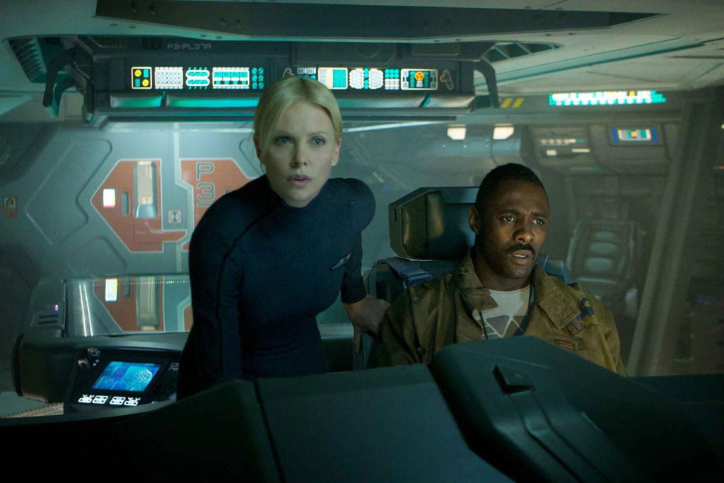 ‘Prometheus’ provides cerebral sci-fi thrills Charlize Theron (left) and Idris Elba in "Prometheus"