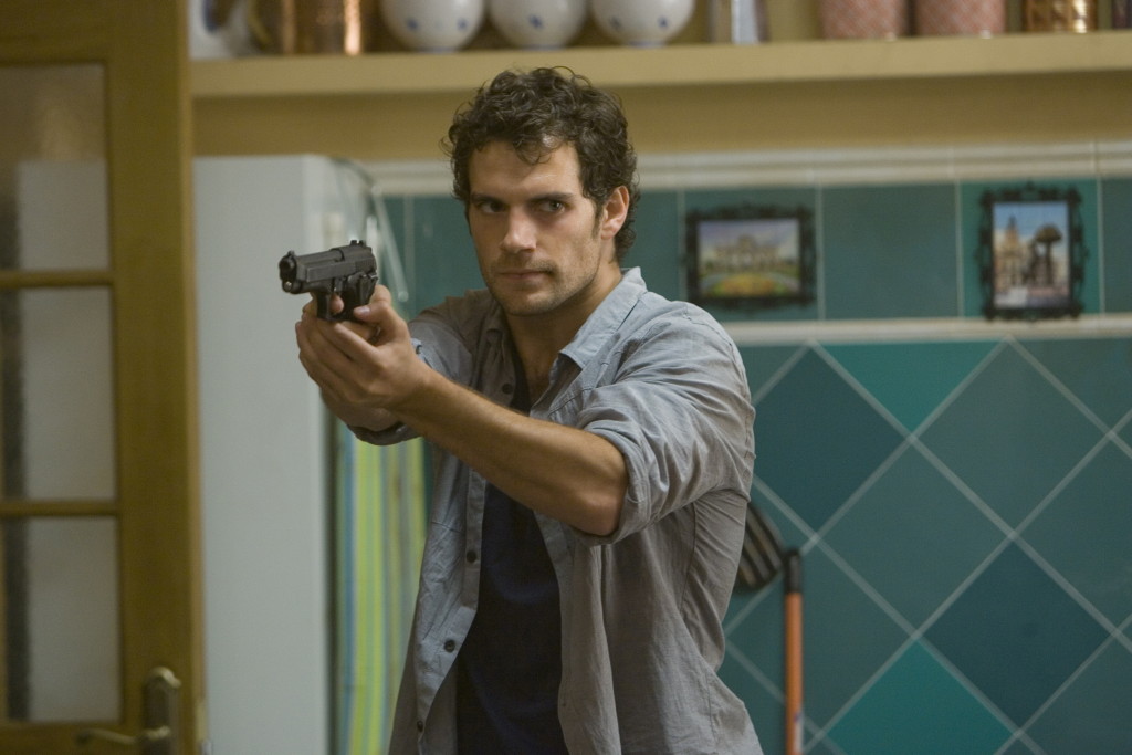 In the Cold (bland and mediocre) Light of Day Movie still feature the film's main star, Henry Cavill