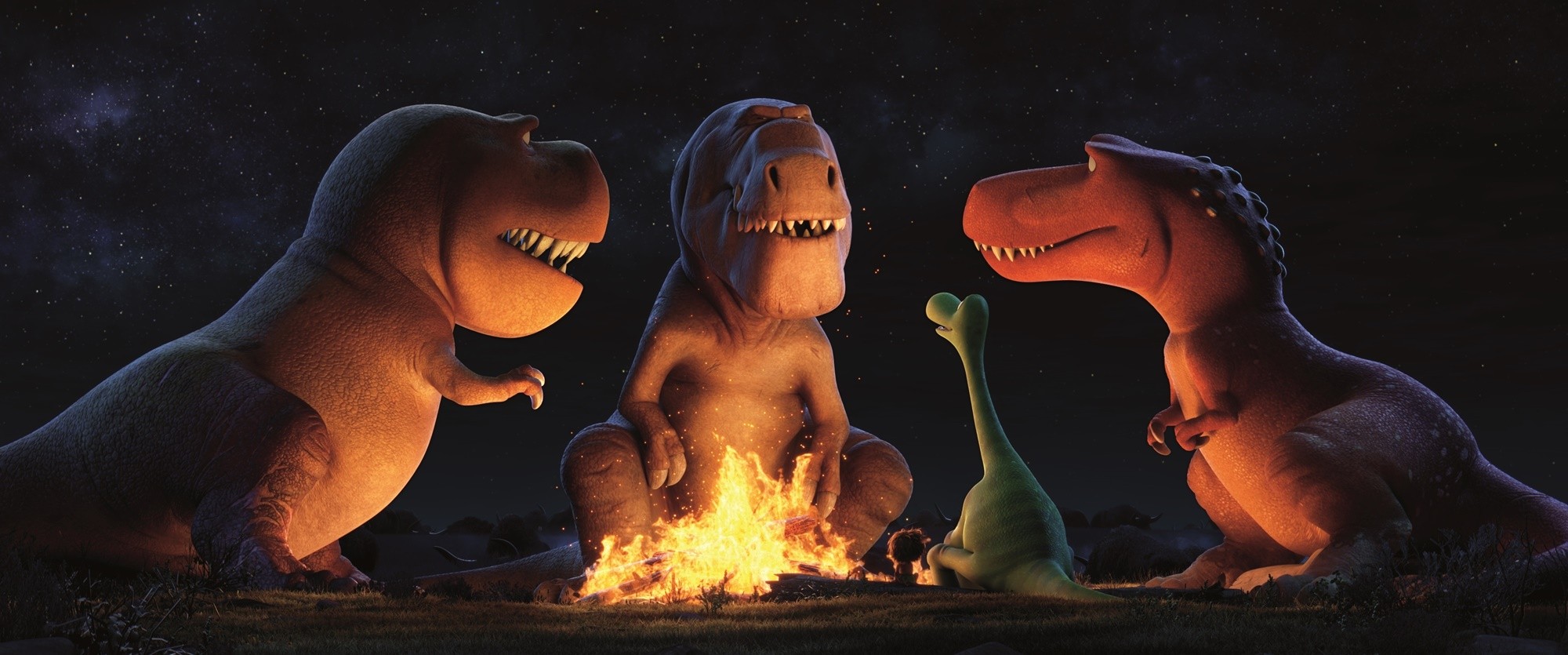 Movie review: ‘The Good Dinosaur’ Nash, Butch and Ramsey visit with Spot and Arlo in a scene from "The Good Dinosaur"