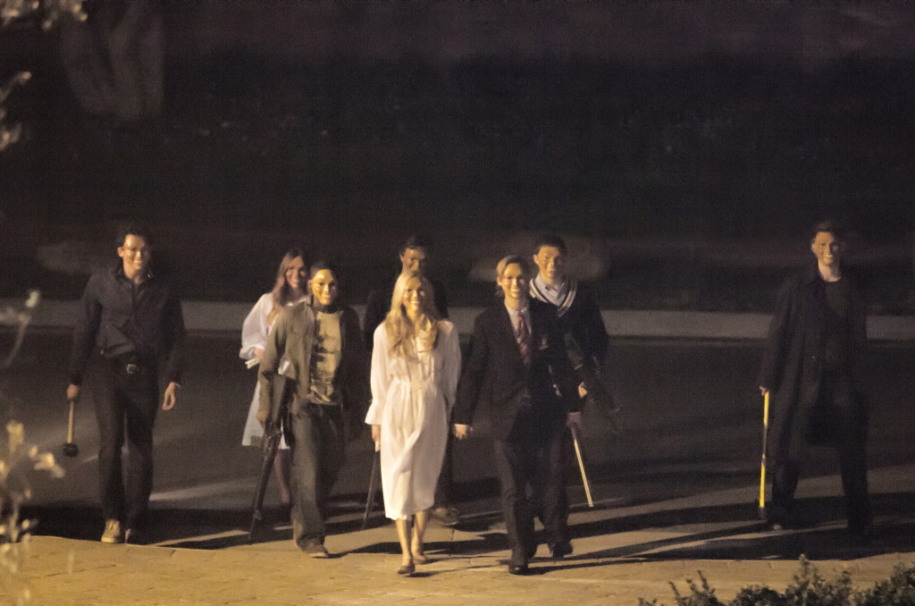 Movie review: Watch ‘The Purge’ when your faith in humanity is too high The Polite Stranger and his gang approach the house in a scene from "The Purge"