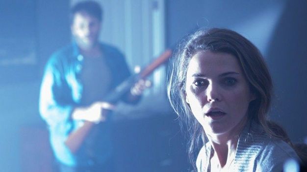 I want to believe… that I didn’t just waste my money on a ‘Signs’ rip-off Still from the movie Dark Skies featuring Keri Russell and Josh Hamilton