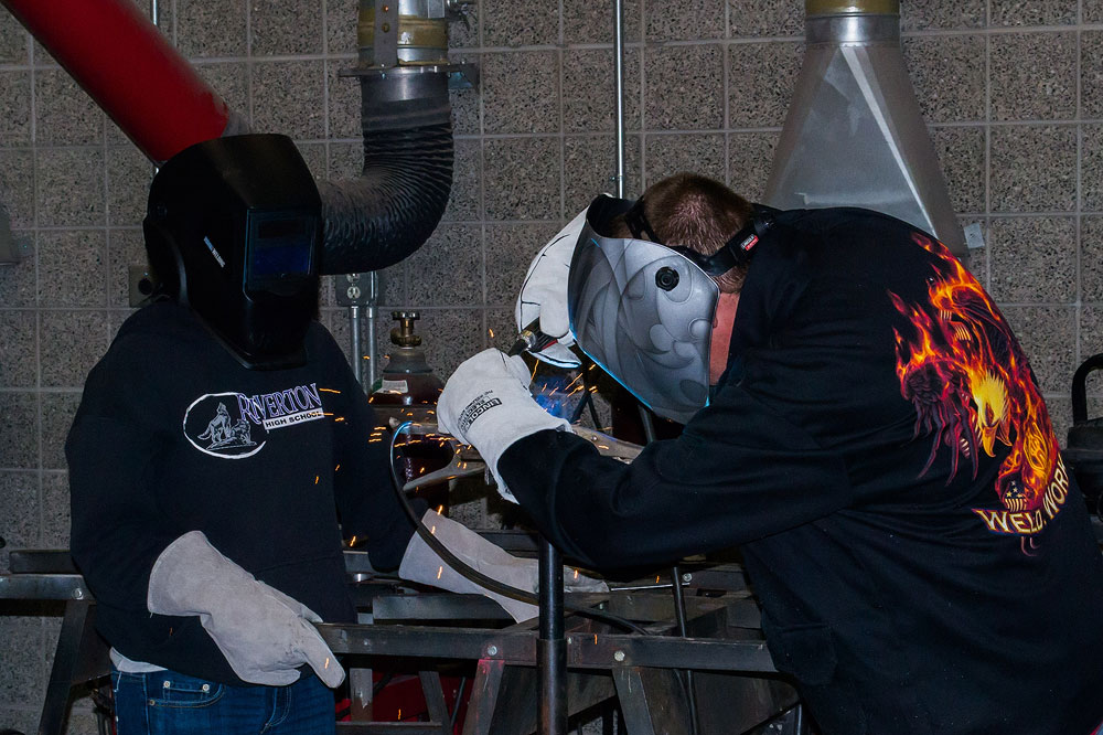 Get your car fixed at Miller Campus auto shop Automotive students welding