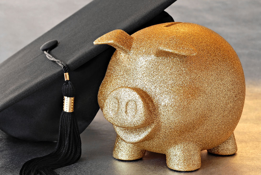 Forum explains potential tuition increase Piggy bank for college