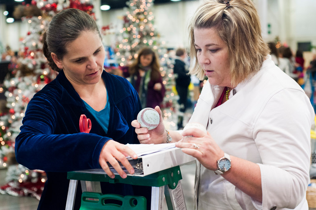Utah’s Festival of Trees returns to raise money for Primary Children’s Chandelle Hunt and Kristi Nuckles discuss a signed baseball to be tagged.
