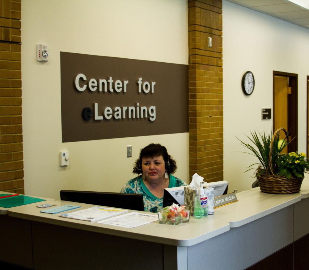 SLCC e-Learning Office plugs students in to online classes LeAnne Madsen at the eLearning Center desk.