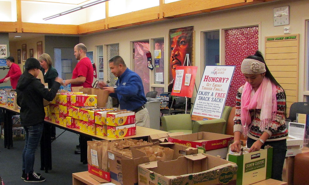 SLCC gives out free healthy snacks for finals Filling snack sacks at SLCC