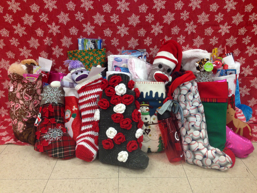 DECA, Interior Design Club embrace the spirit of giving Helping Kids with Cancer stockings