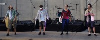 Rhythmic Circus performers on stage