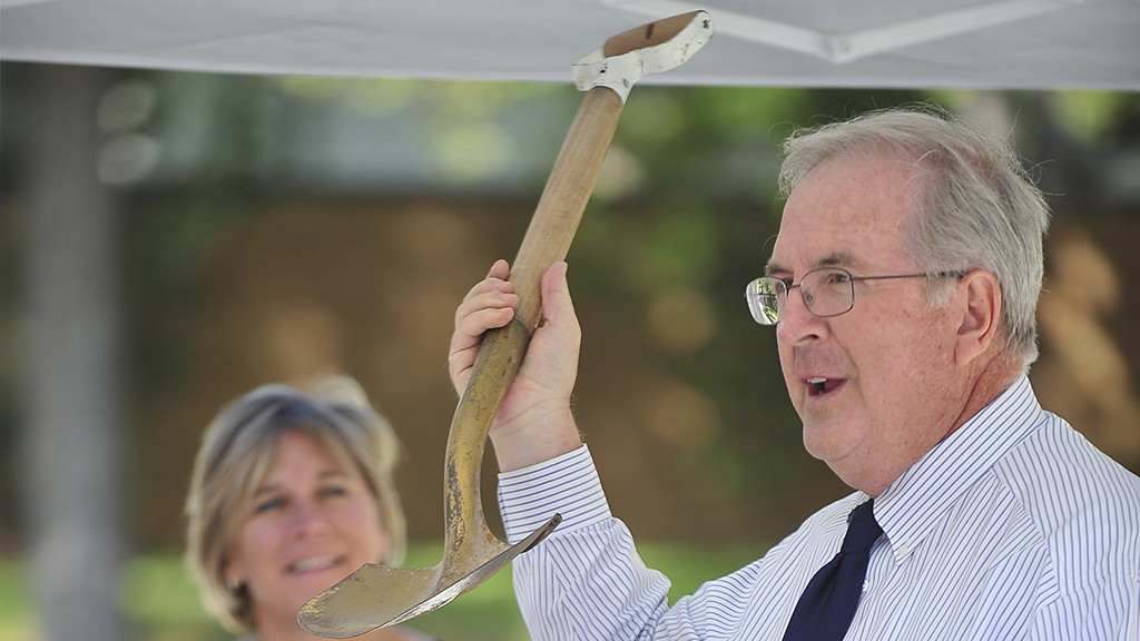 New quad at Taylorsville Redwood Campus set in memory of former college president Bruce Nelson holds shovel