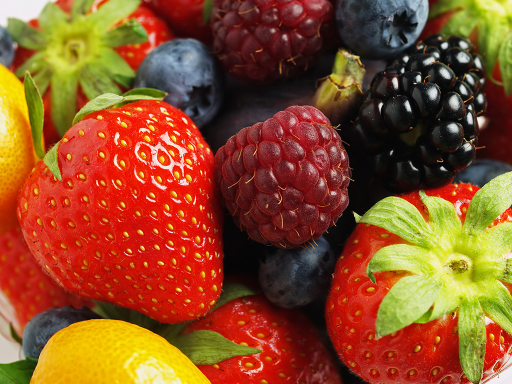 Use healthy food to increase your brain power for finals week Strawberries, blackberries, blueberries and oranges