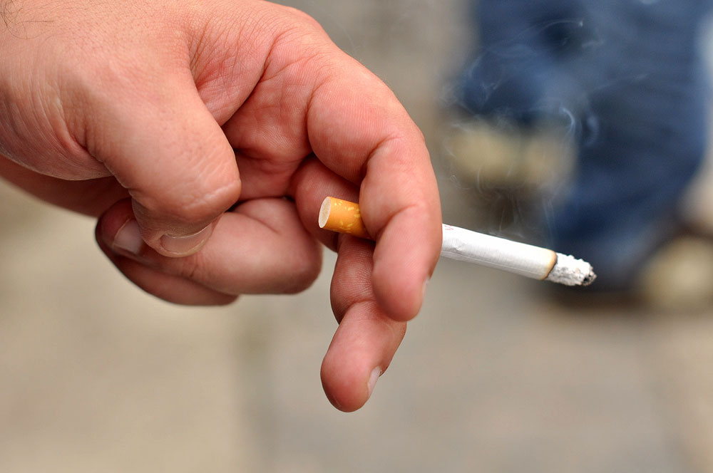 SHAC invites student smokers to quit for a day Lit cigarette
