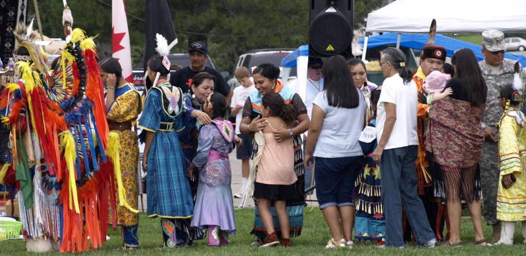 Native Americans mark Pioneer Day with Pow Wow Hugs and handshakes after the dance