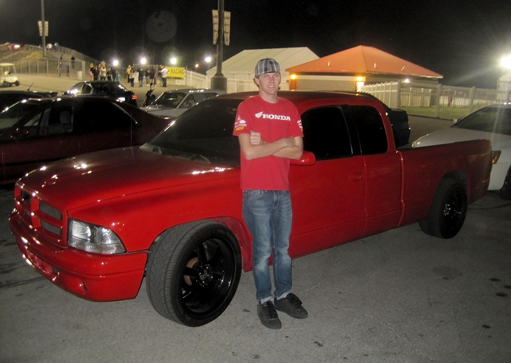 Thunder on the Blacktop Man standing by truck