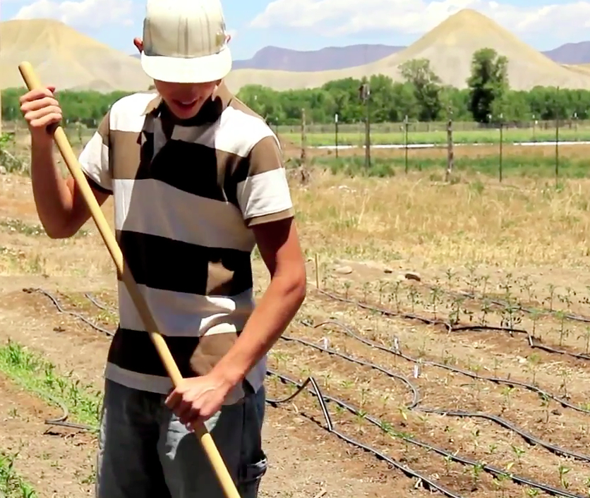 Program helps students save money and contribute to the community Working in the garden