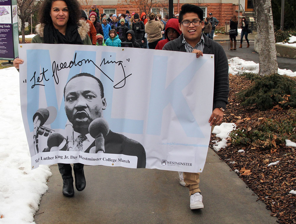 Photos: MLK Day march in SLC Marchers hold "Let Freedom Ring" banner