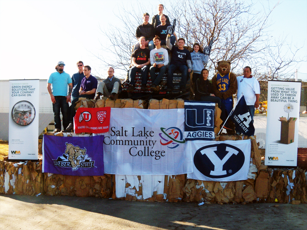 Students kick off RecycleMania 2012 tournament Students climb the recycled waste for a group photograph